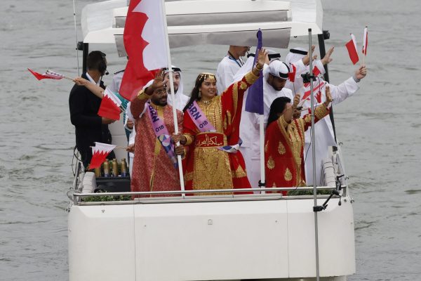 Paris 2024 Olympics - Opening Ceremony - Paris, France - July 26, 2024. Team Bahrain aboard a boat in the floating parade on the river Seine during the opening ceremony. REUTERS/Albert Gea