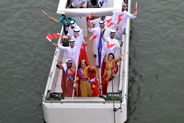 Bahrain's delegation sails on a boat during the opening ceremony of the Paris 2024 Olympic Games in Paris on July 26, 2024. (Photo by Damien MEYER / AFP)